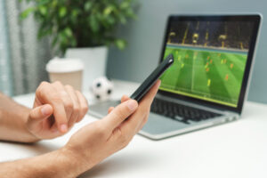 shutterstock 1903610854 1 300x200 - Close,Up,Cropped,Shot,Of,Male,Hand,Holding,Smartphone.,Man